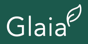Logo of Glaia is white text on green background, with a white leaf after the final a